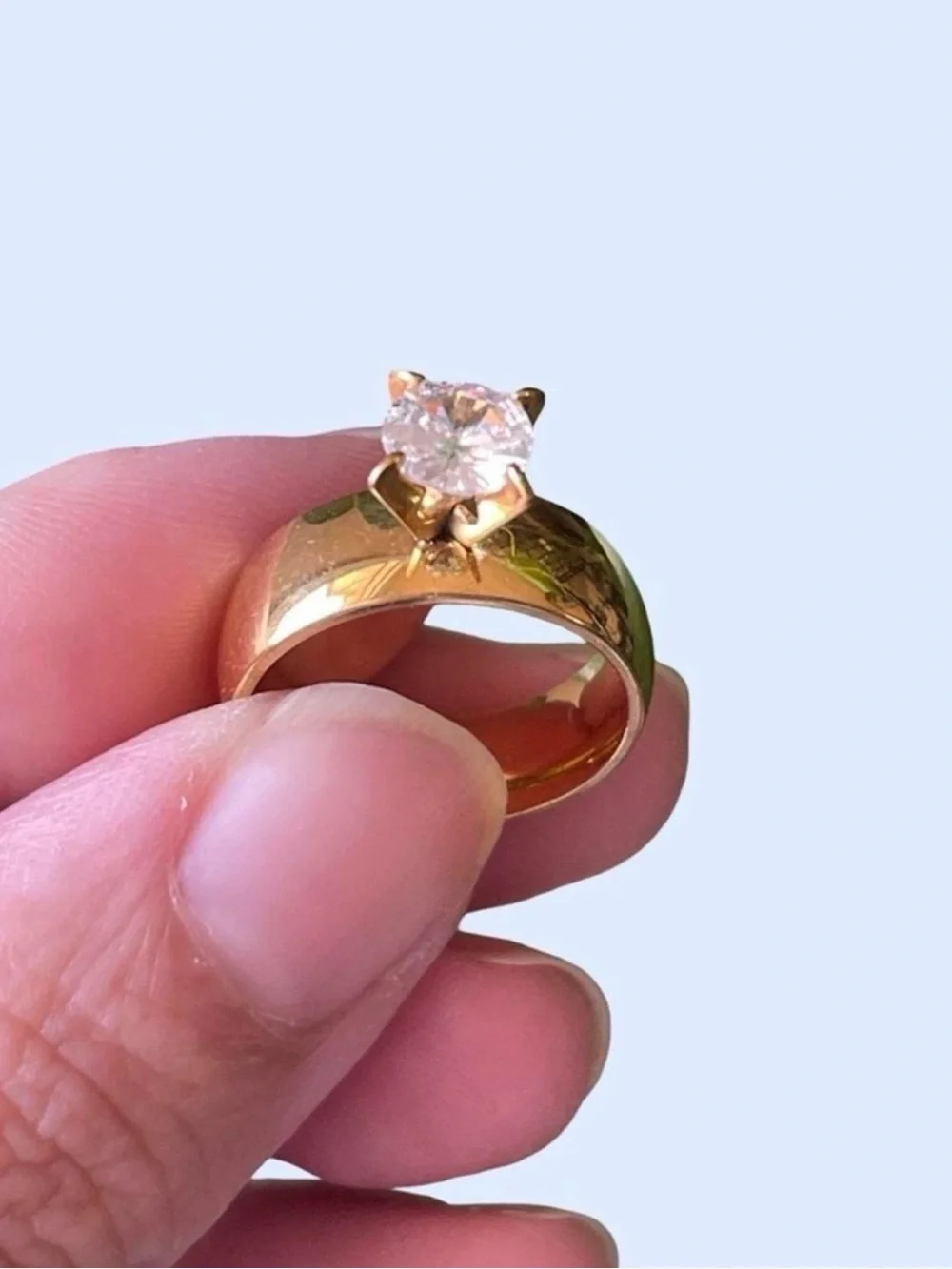 Gold Solitaire Ring with Clear Stone